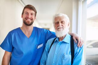A nurse with a nursing home resident